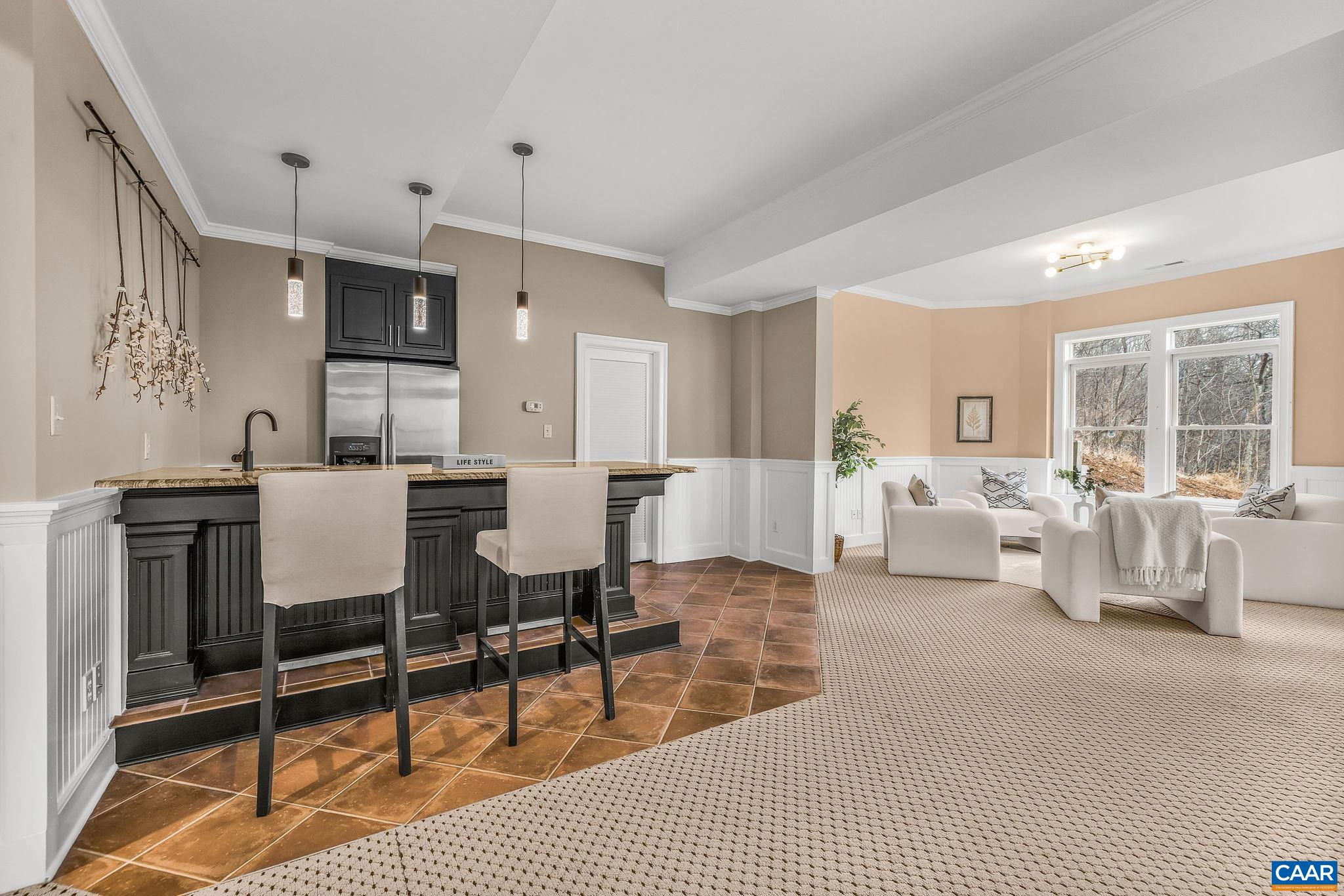 2556 Summit Ridge Trail Charlottesville, VA 22911 - Photo 71 of 75 a living room with furniture a large window and kitchen view