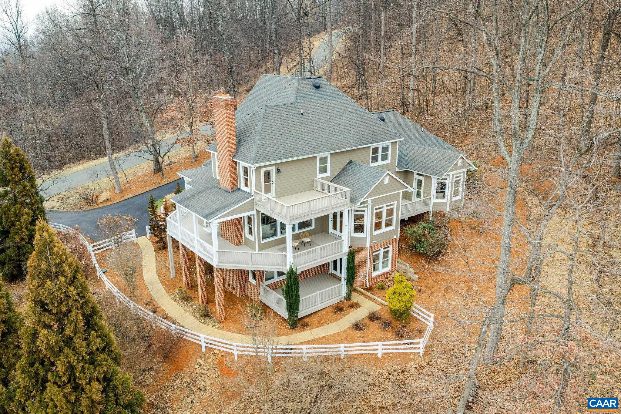 2556 Summit Ridge Trail Charlottesville, VA 22911 - Photo 8 of 75 an aerial view of a house with a swimming pool