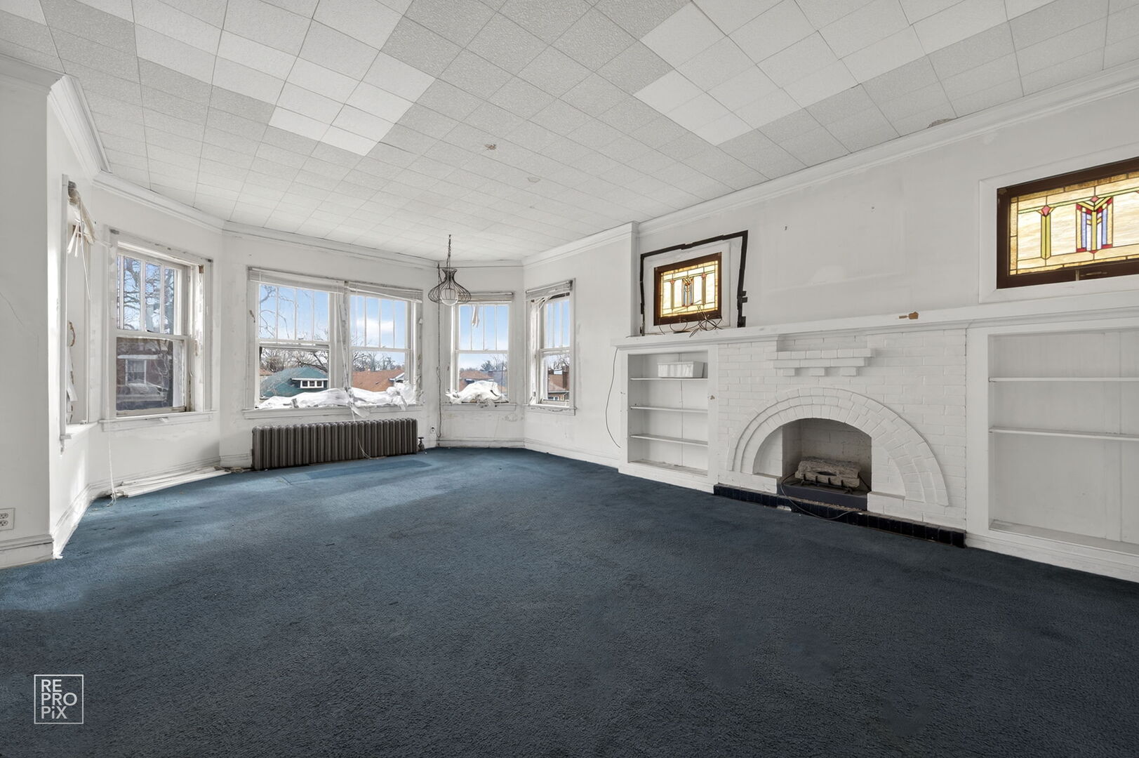 7236 South Michigan Avenue Chicago, IL 60619 - Photo 11 of 15 a view of empty room with a fireplace