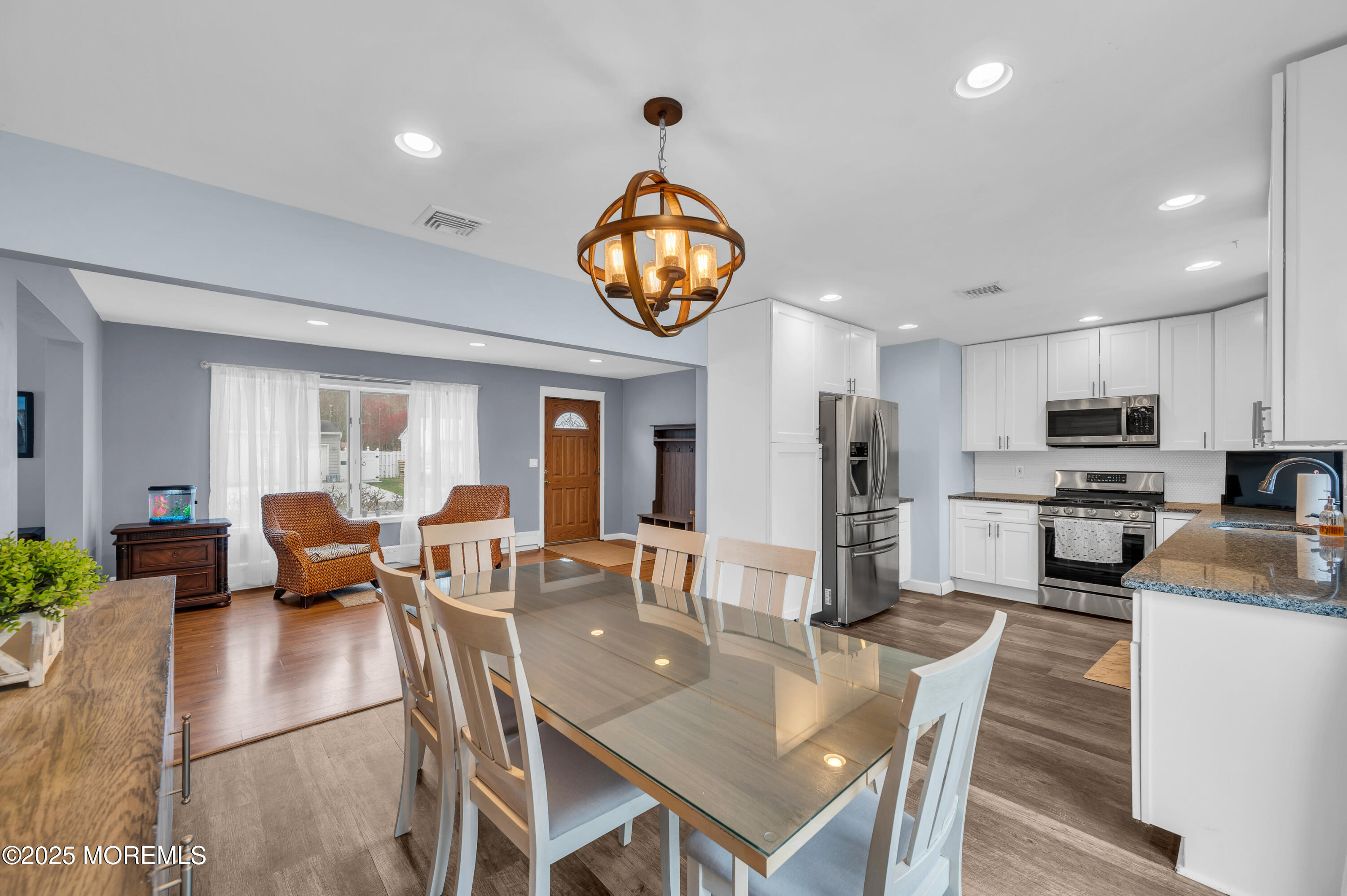 408 Cedar Drive Lanoka Harbor, NJ 08734 - Photo 14 of 39 a view of a dining room with furniture window and wooden floor