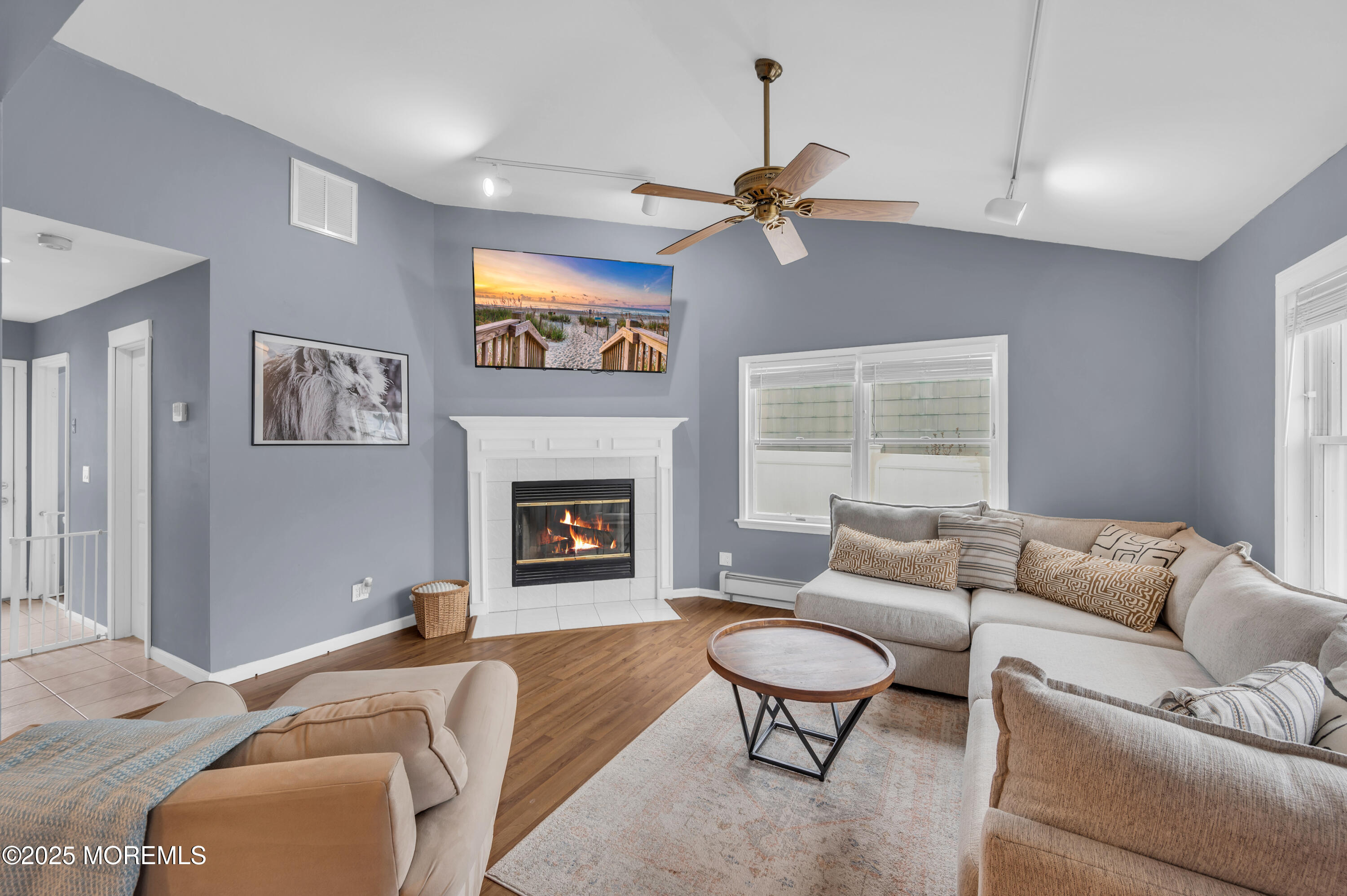 408 Cedar Drive Lanoka Harbor, NJ 08734 - Photo 16 of 39 a living room with furniture and a fireplace