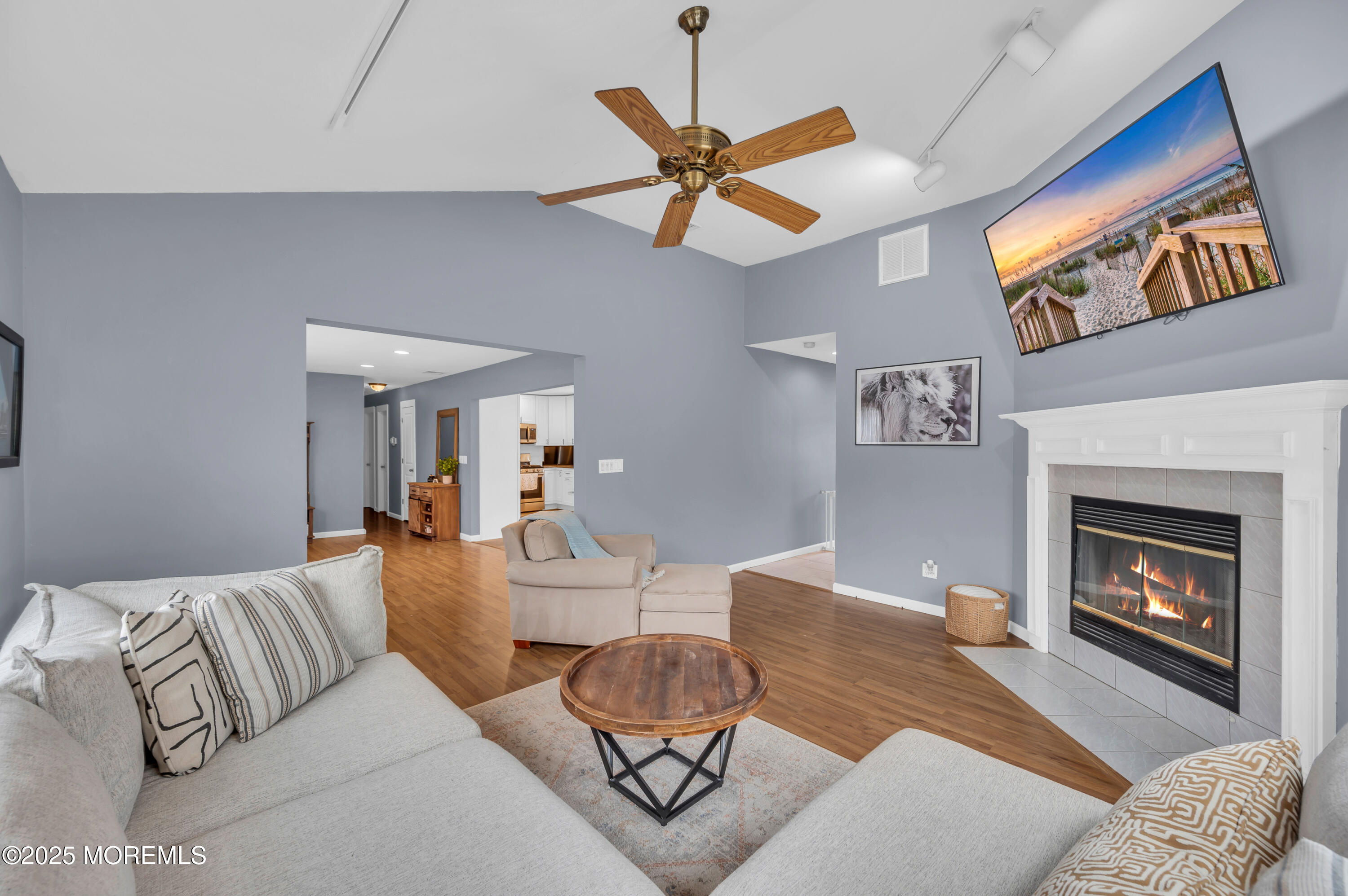 408 Cedar Drive Lanoka Harbor, NJ 08734 - Photo 17 of 39 a living room with furniture and a fireplace