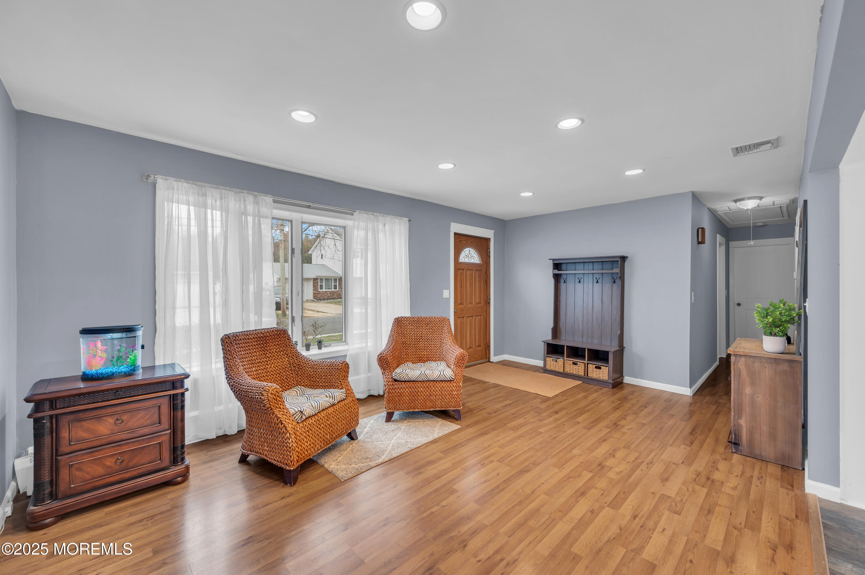 408 Cedar Drive Lanoka Harbor, NJ 08734 - Photo 20 of 39 a living room with furniture and a wooden floor