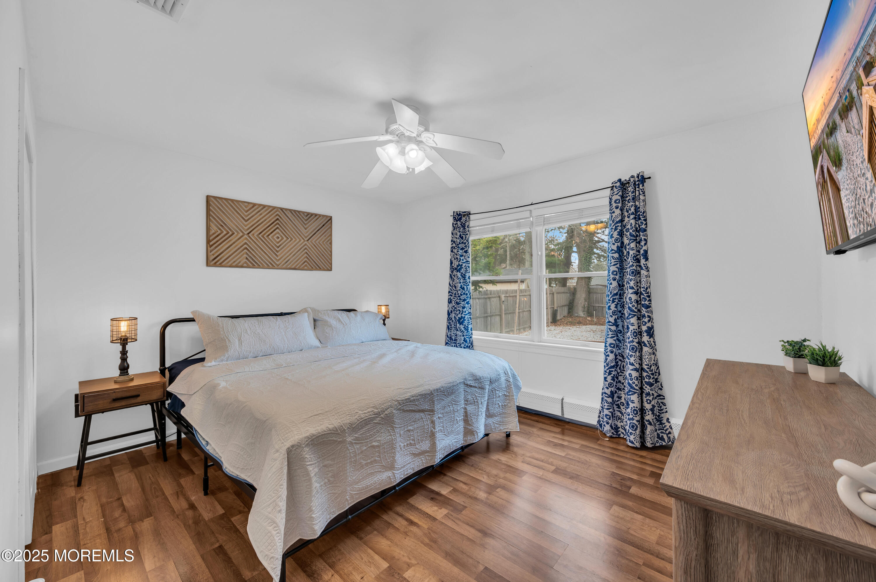 408 Cedar Drive Lanoka Harbor, NJ 08734 - Photo 21 of 39 a bedroom with a bed and a desk