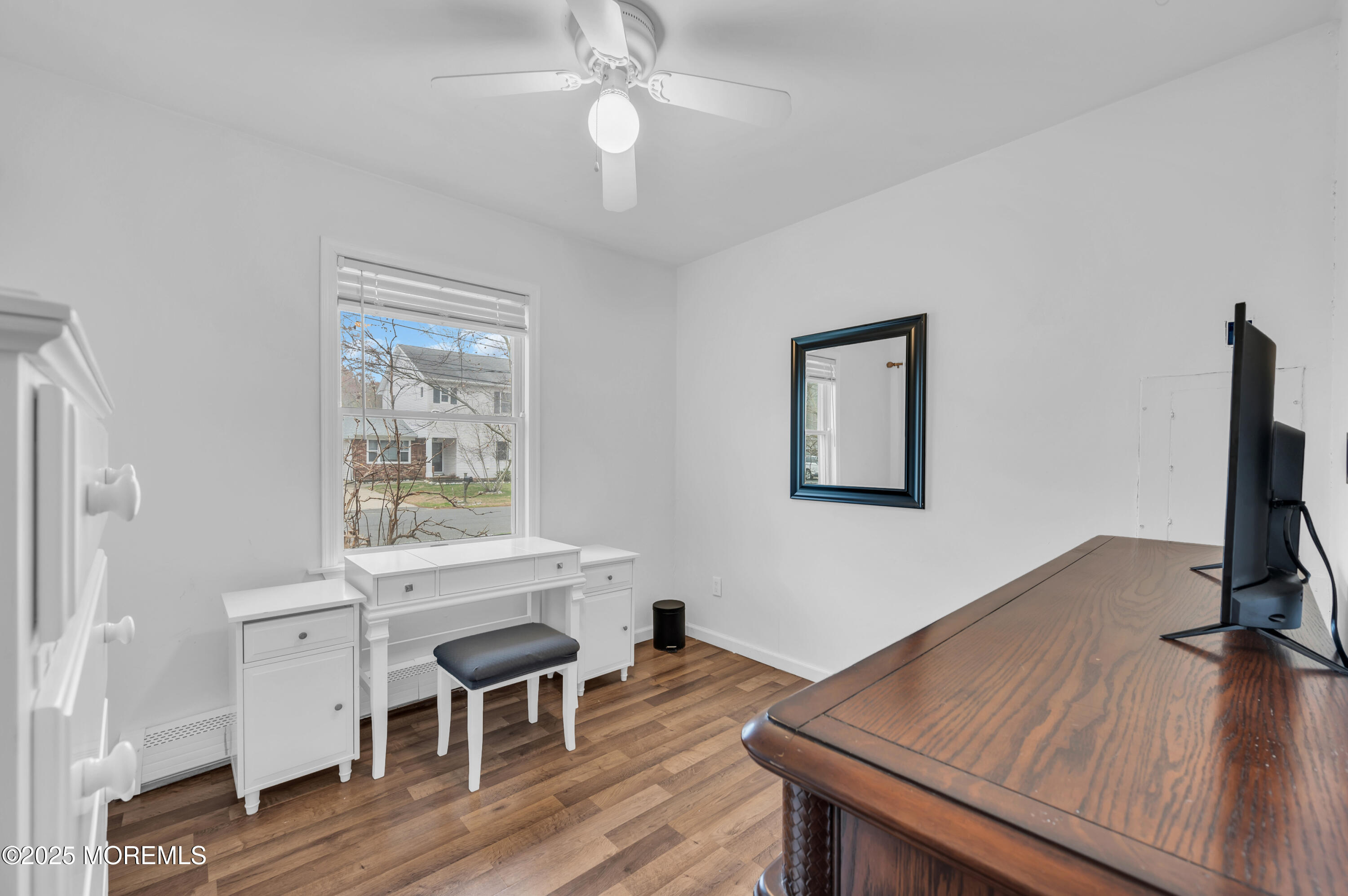 408 Cedar Drive Lanoka Harbor, NJ 08734 - Photo 23 of 39 a workspace with furniture window and wooden floor