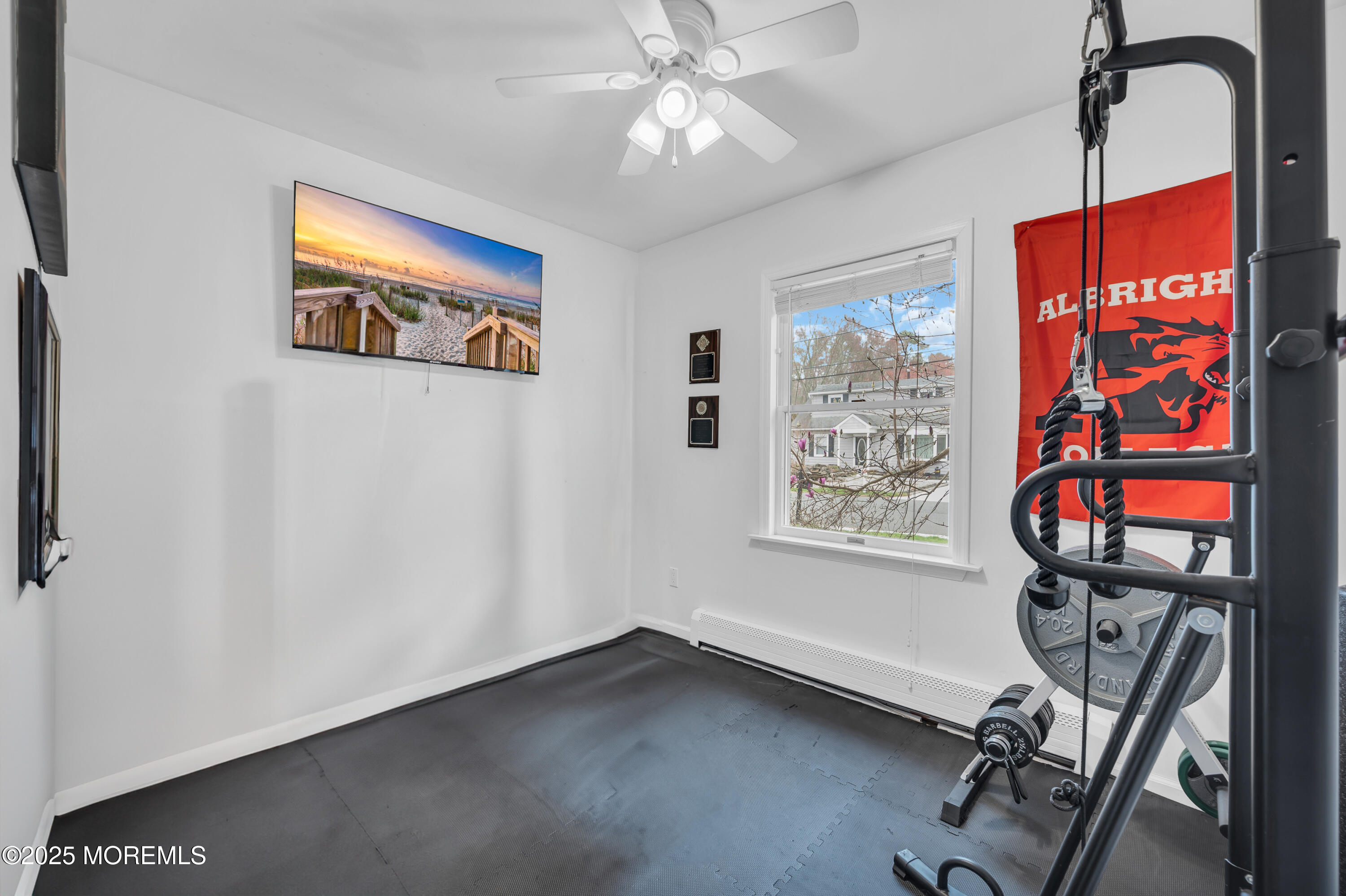 408 Cedar Drive Lanoka Harbor, NJ 08734 - Photo 26 of 39 a view of a workspace with furniture and a window