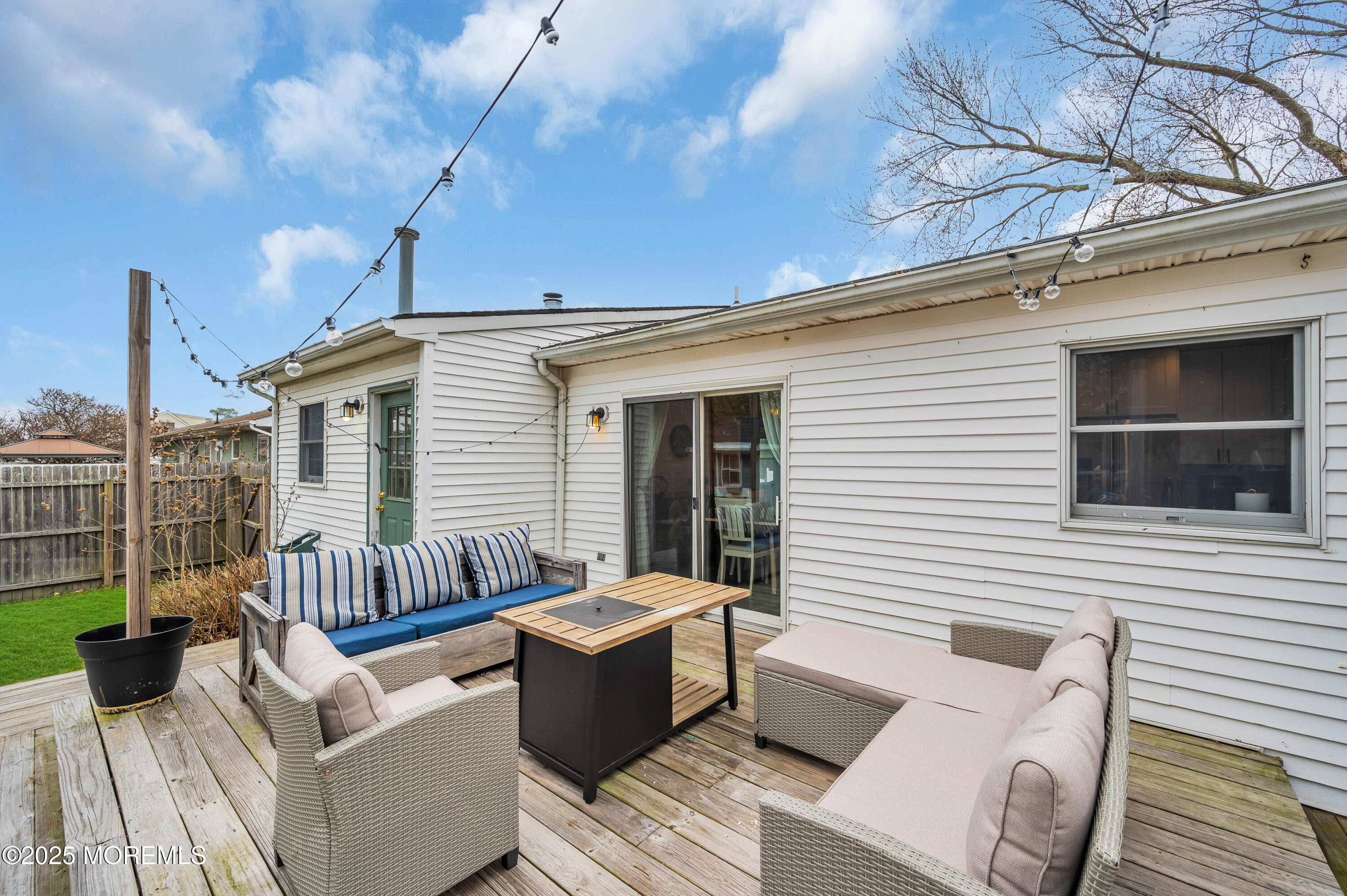 408 Cedar Drive Lanoka Harbor, NJ 08734 - Photo 29 of 39 a view of a deck with couches chairs with wooden floor