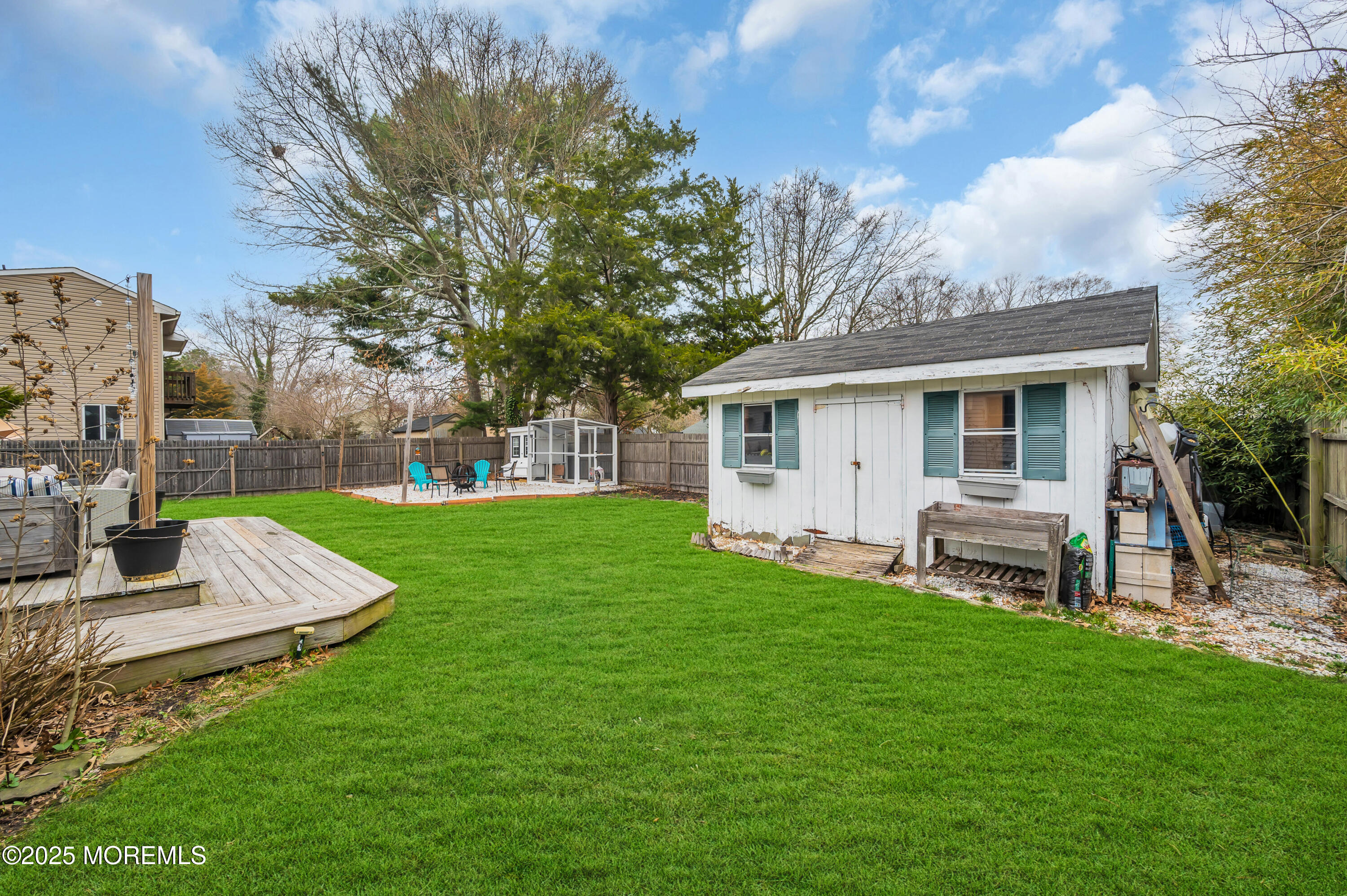 408 Cedar Drive Lanoka Harbor, NJ 08734 - Photo 33 of 39 a view of a house with a backyard and a patio