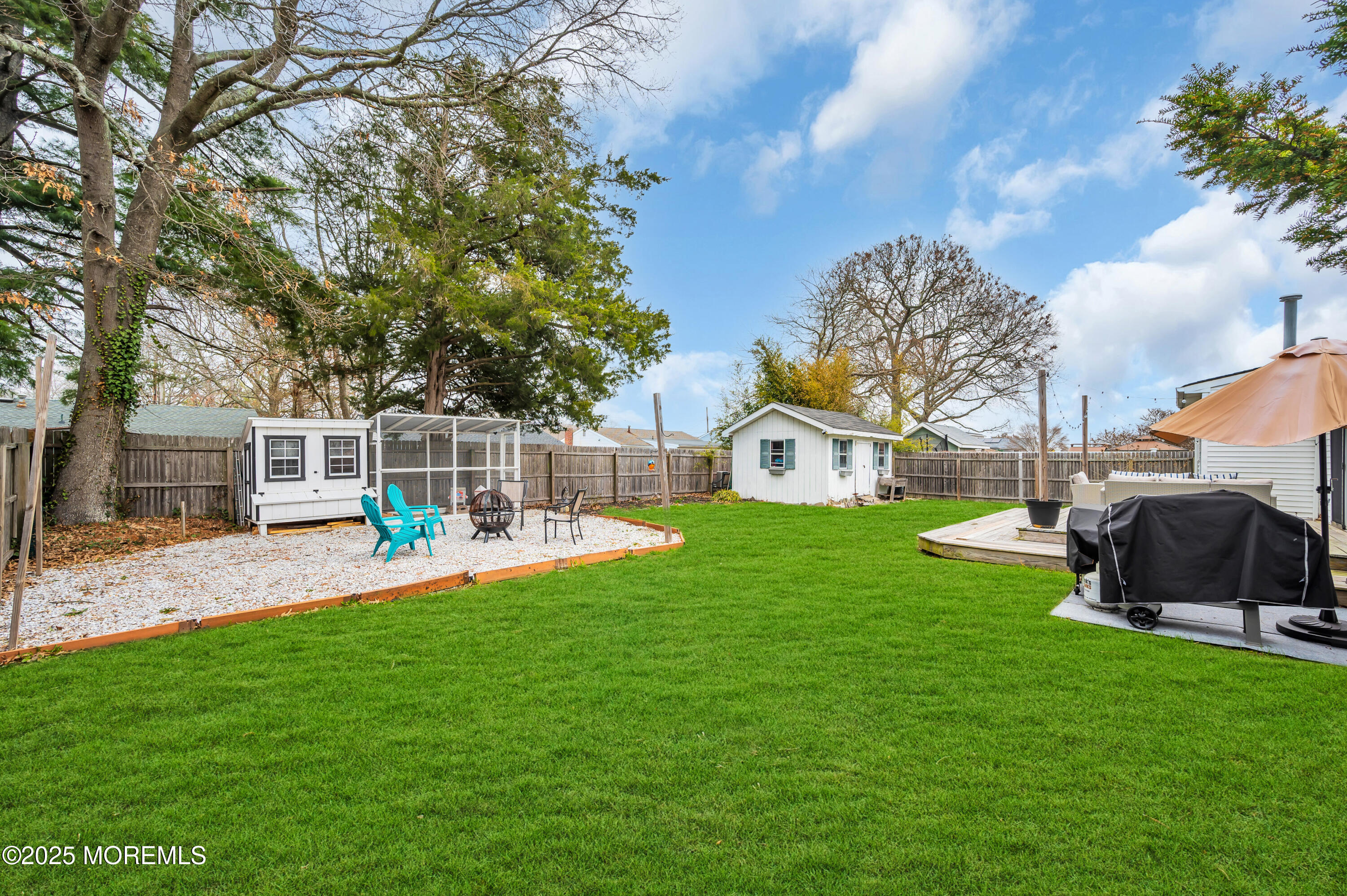 408 Cedar Drive Lanoka Harbor, NJ 08734 - Photo 35 of 39 a front view of a house with garden and porch