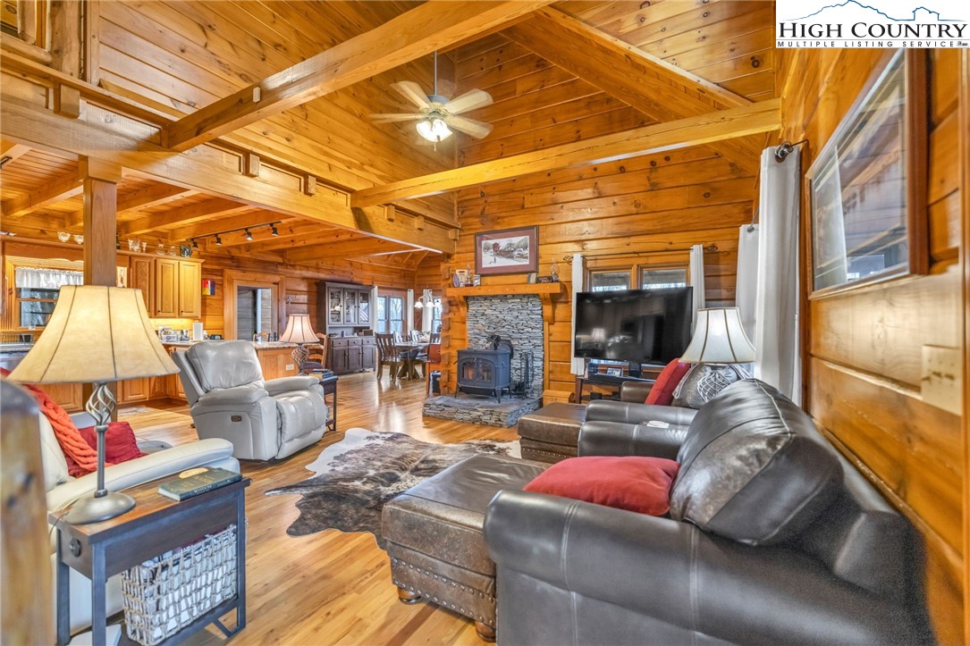 632 Big Tree Road West Jefferson, NC 28694 - Photo 12 of 48 a living room with furniture and a flat screen tv