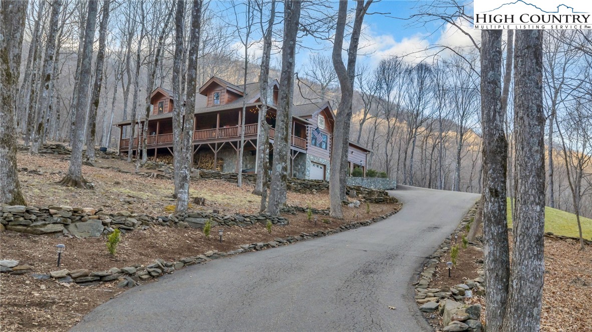 632 Big Tree Road West Jefferson, NC 28694 - Photo 2 of 48 a view of a house with a yard