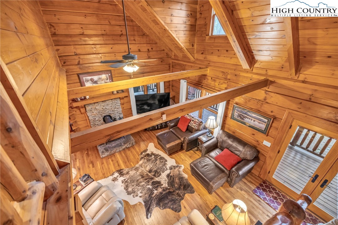 632 Big Tree Road West Jefferson, NC 28694 - Photo 30 of 48 a view of a balcony with wooden floor and fence