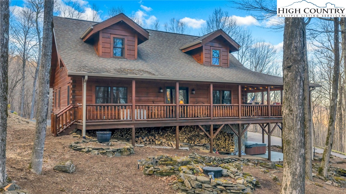 632 Big Tree Road West Jefferson, NC 28694 - Photo 3 of 48 a view of a house with a yard and sitting area