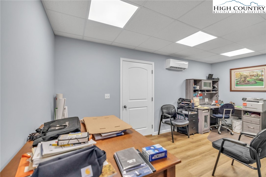 632 Big Tree Road West Jefferson, NC 28694 - Photo 39 of 48 a bedroom with furniture and a wooden floor