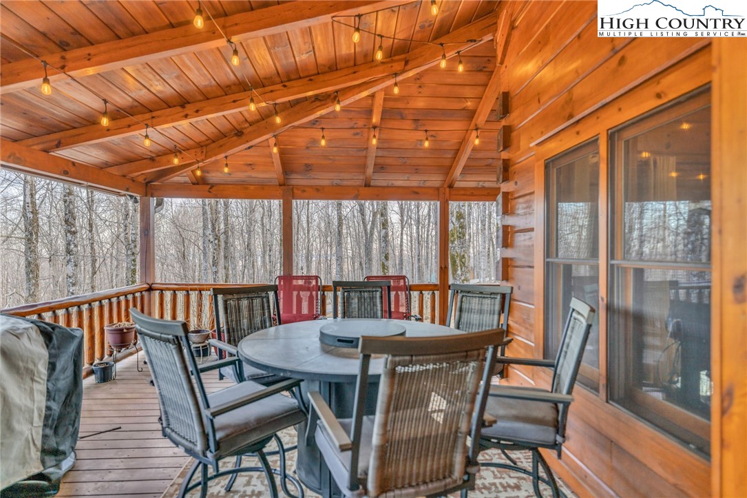 632 Big Tree Road West Jefferson, NC 28694 - Photo 46 of 48 a view of a patio with a table and chairs