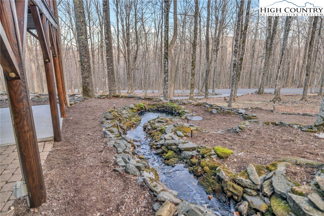 632 Big Tree Road West Jefferson, NC 28694 - Photo 6 of 48 a view of a backyard with chairs