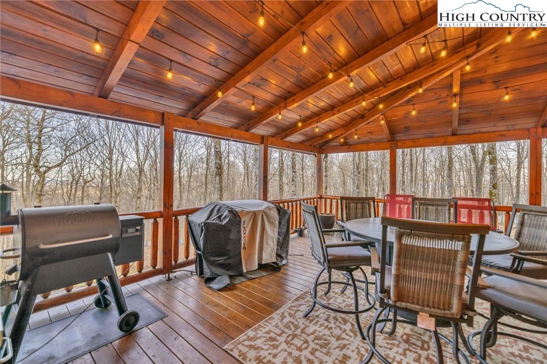 632 Big Tree Road West Jefferson, NC 28694 - Photo 9 of 48 a view of a patio with table and chairs