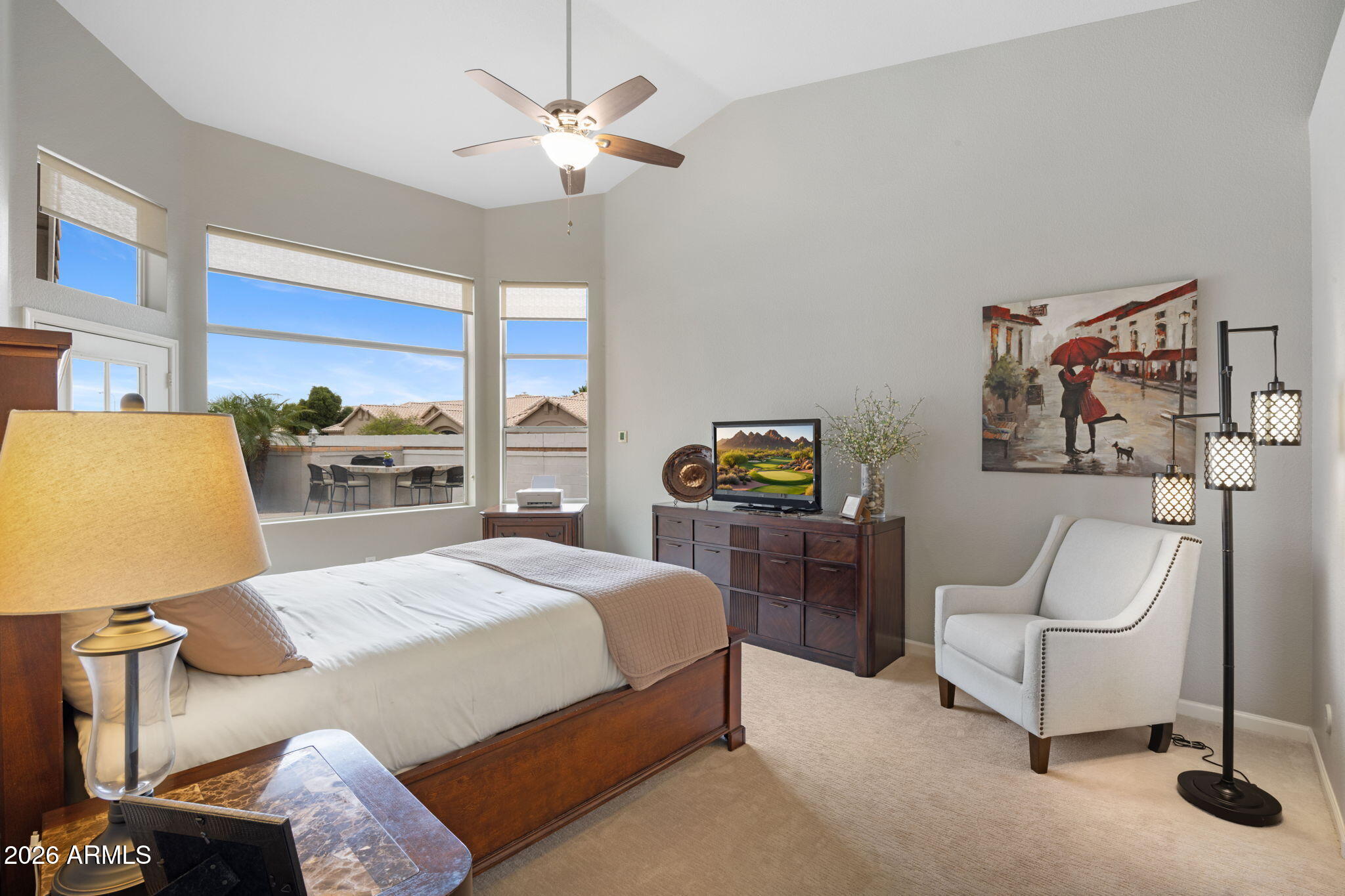 16008 South 38th Way Phoenix, AZ 85048 - Photo 22 of 47 a bedroom with a bed and a chandelier