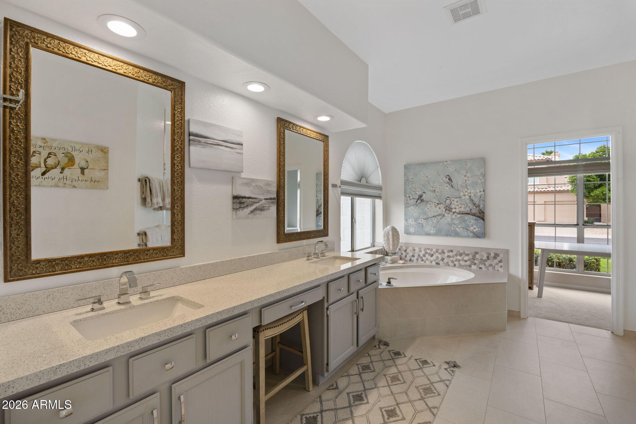 16008 South 38th Way Phoenix, AZ 85048 - Photo 25 of 47 a spacious bathroom with a tub sink and mirror