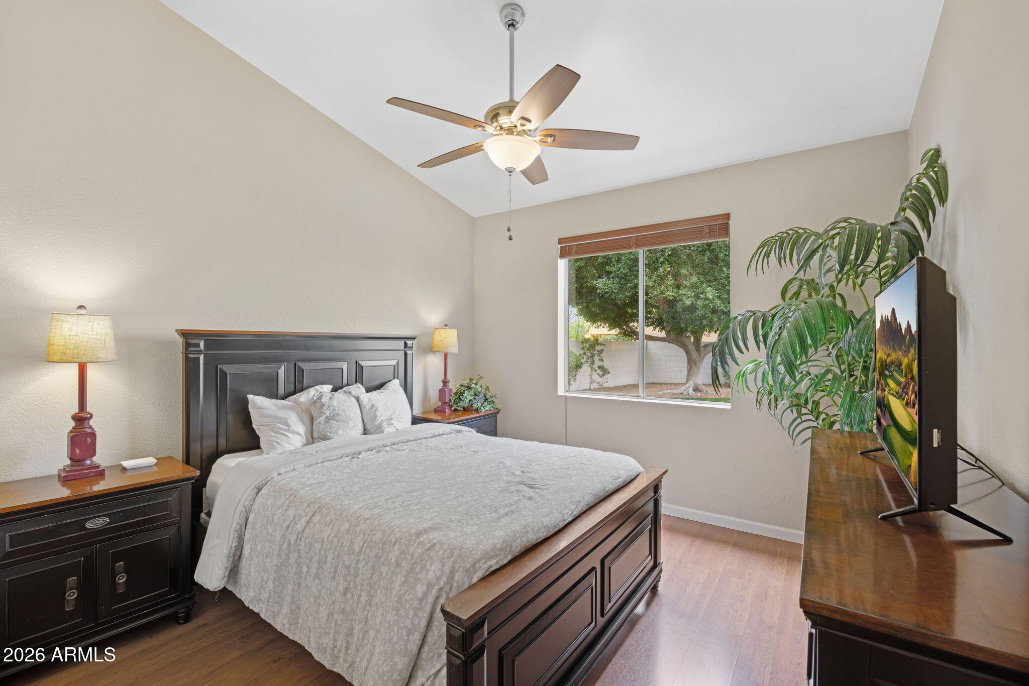 16008 South 38th Way Phoenix, AZ 85048 - Photo 30 of 47 a bedroom with a bed and a window
