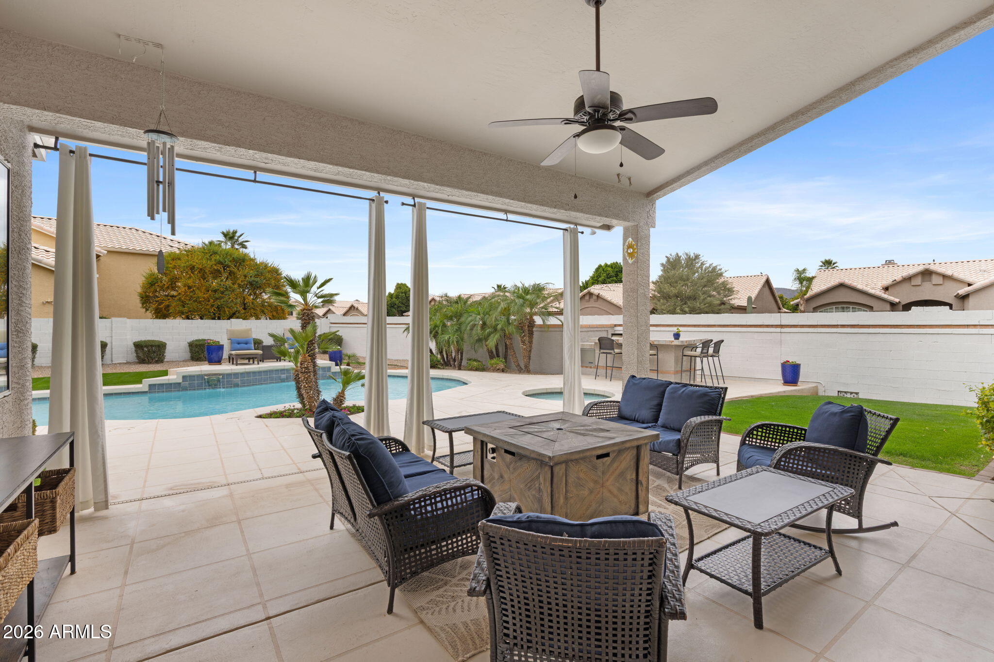 16008 South 38th Way Phoenix, AZ 85048 - Photo 35 of 47 a view of a patio with a table and chairs