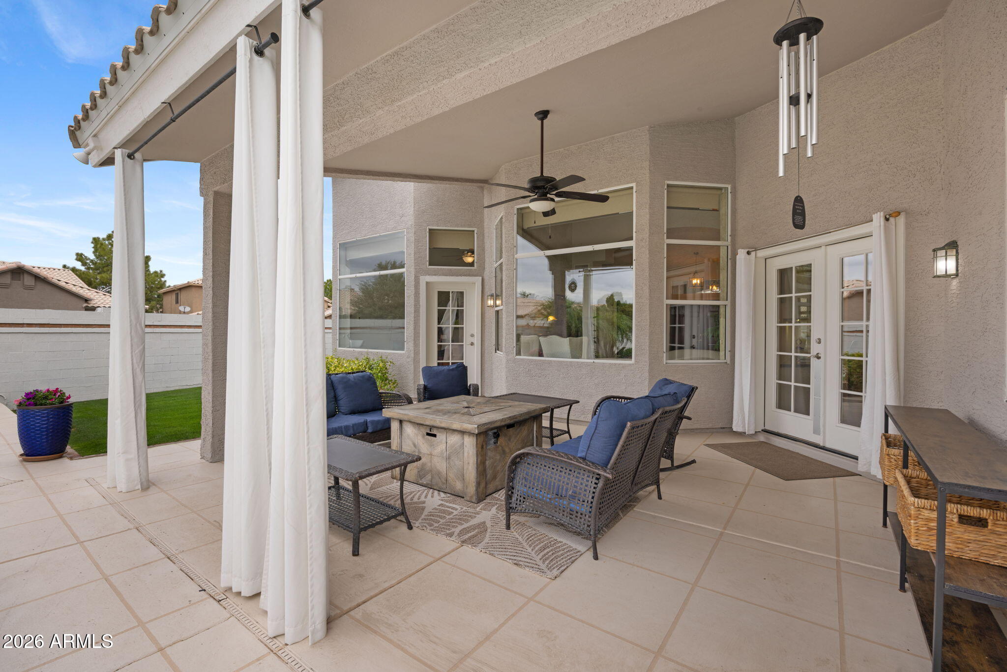16008 South 38th Way Phoenix, AZ 85048 - Photo 36 of 47 a building outdoor space with patio furniture and potted plants