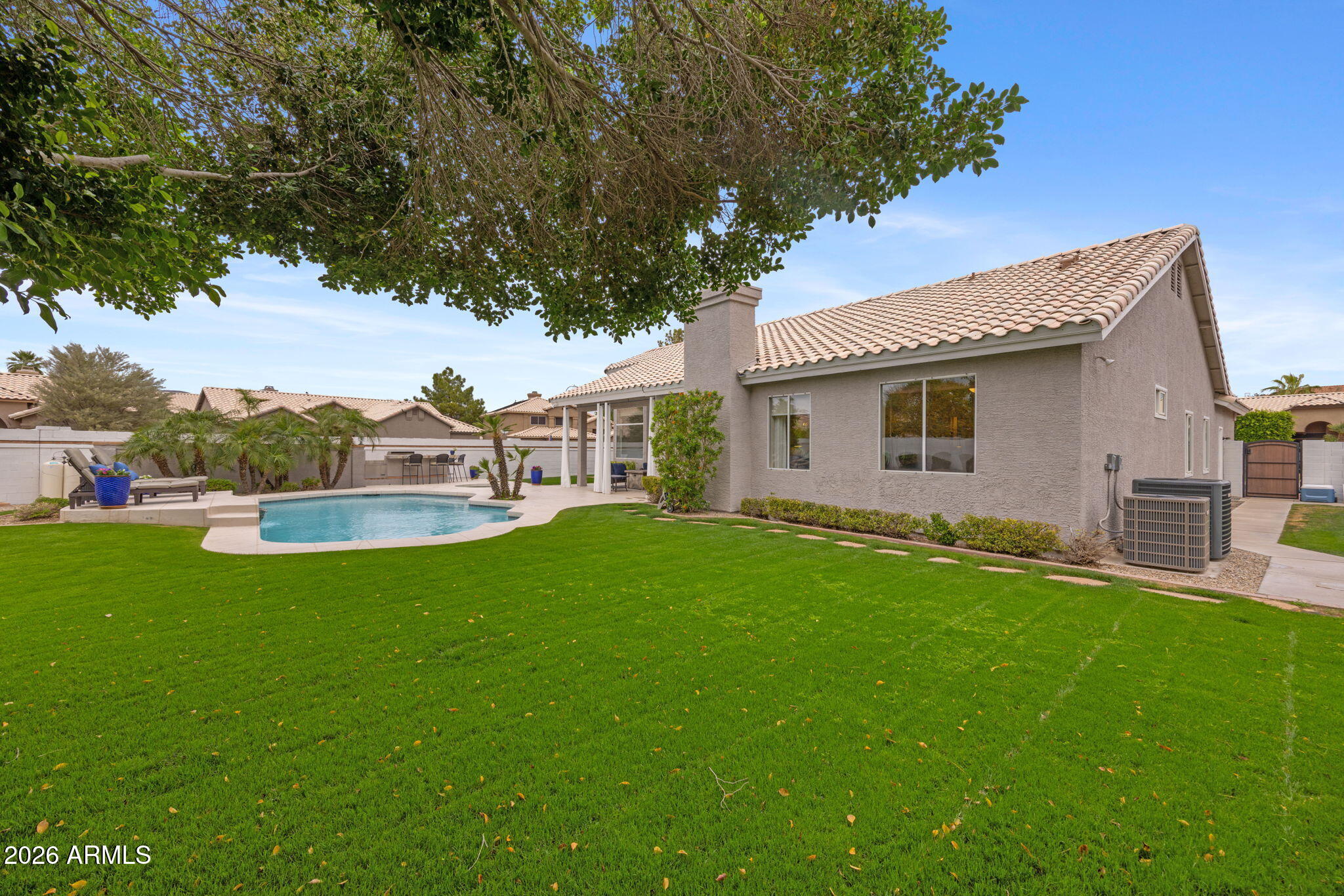 16008 South 38th Way Phoenix, AZ 85048 - Photo 41 of 47 a view of a house with a backyard