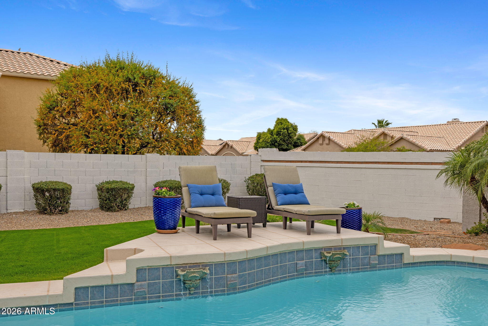 16008 South 38th Way Phoenix, AZ 85048 - Photo 45 of 47 a view of house with backyard outdoor seating and hardwood