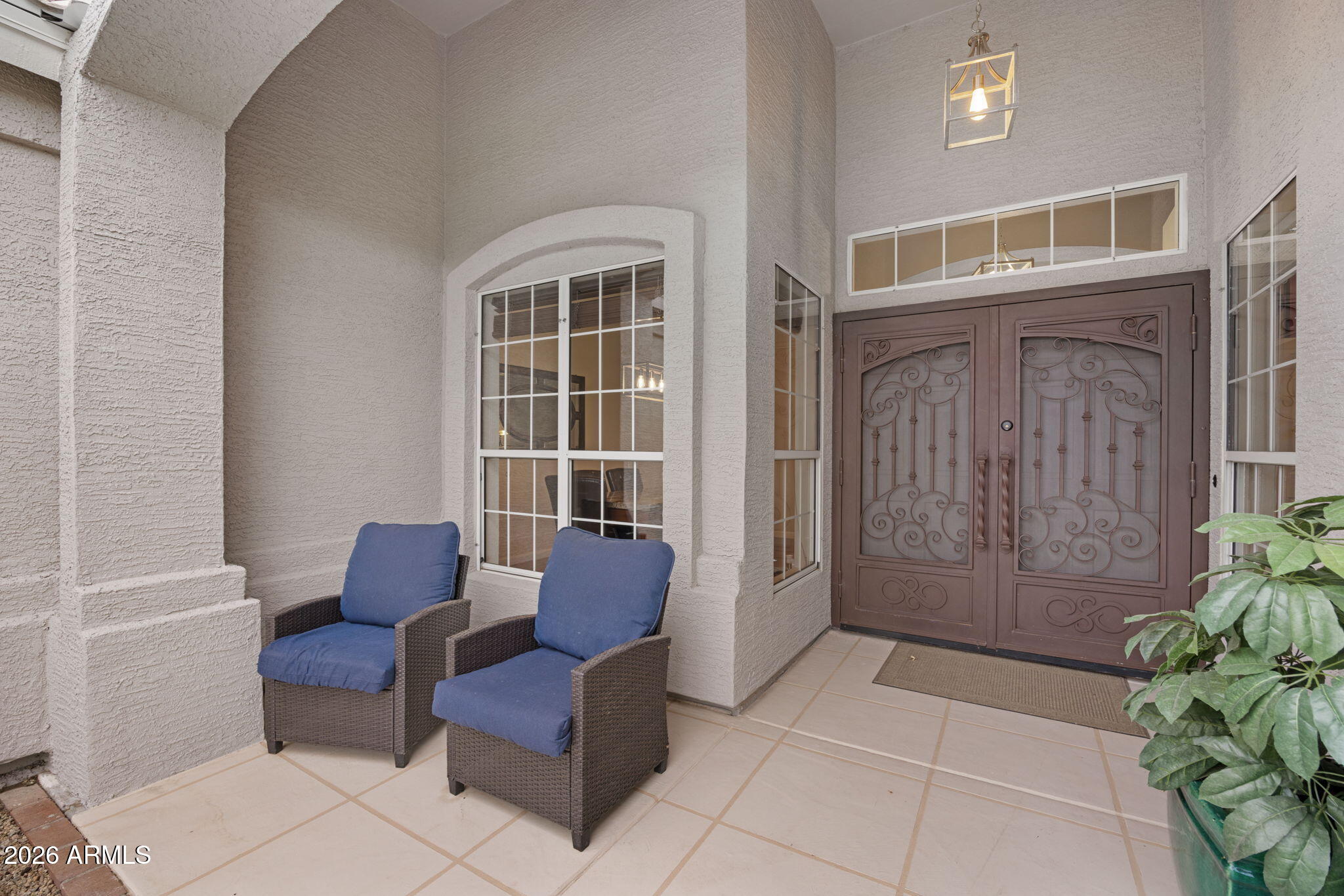 16008 South 38th Way Phoenix, AZ 85048 - Photo 5 of 47 a living room with furniture and windows