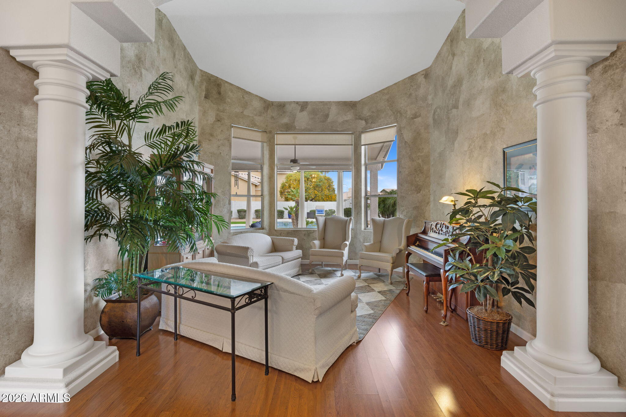 16008 South 38th Way Phoenix, AZ 85048 - Photo 8 of 47 a living room with furniture and a potted plant