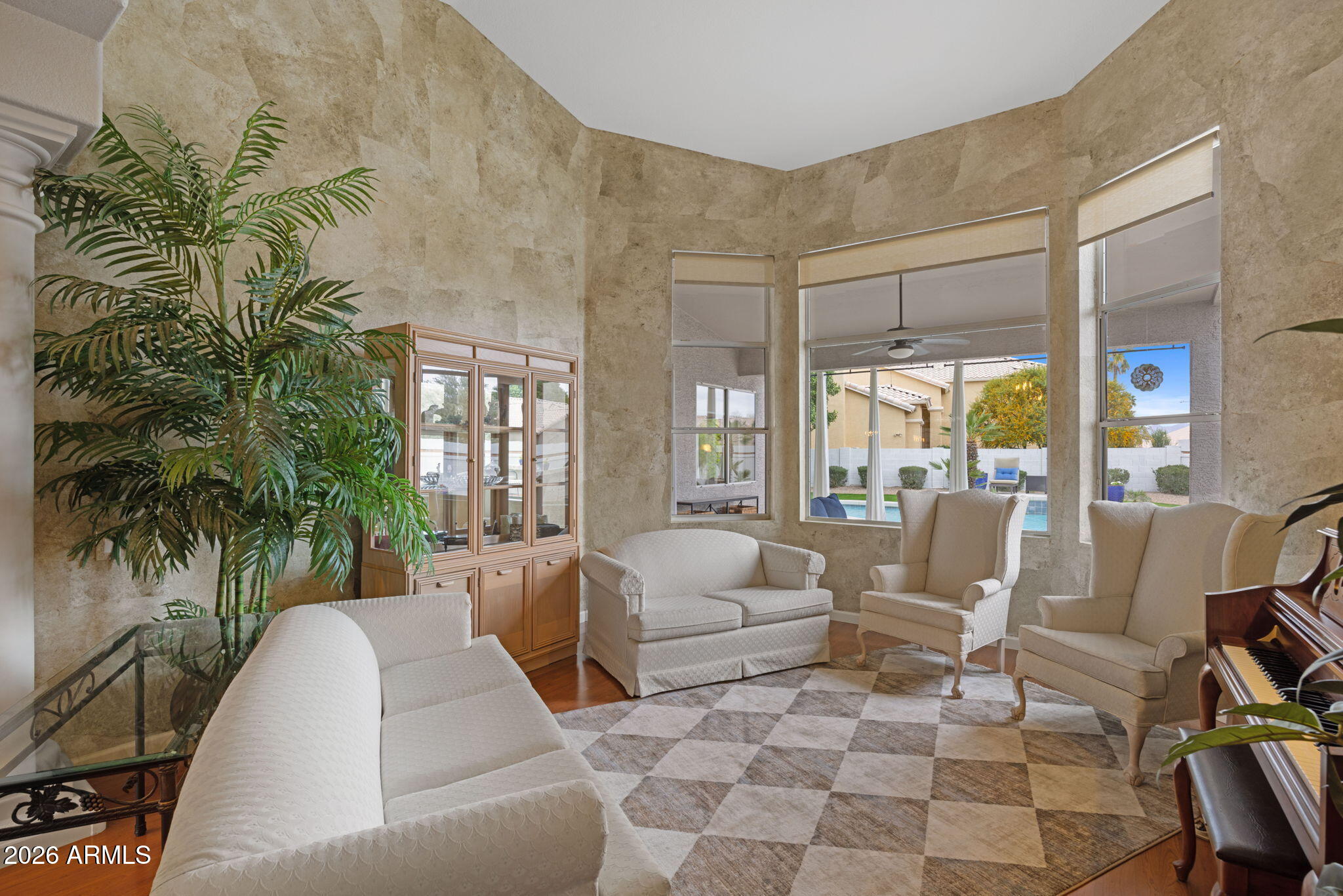 16008 South 38th Way Phoenix, AZ 85048 - Photo 9 of 47 a living room with furniture and a large window