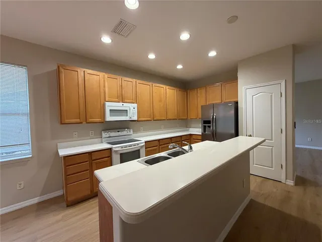 a view of a livingroom and a window