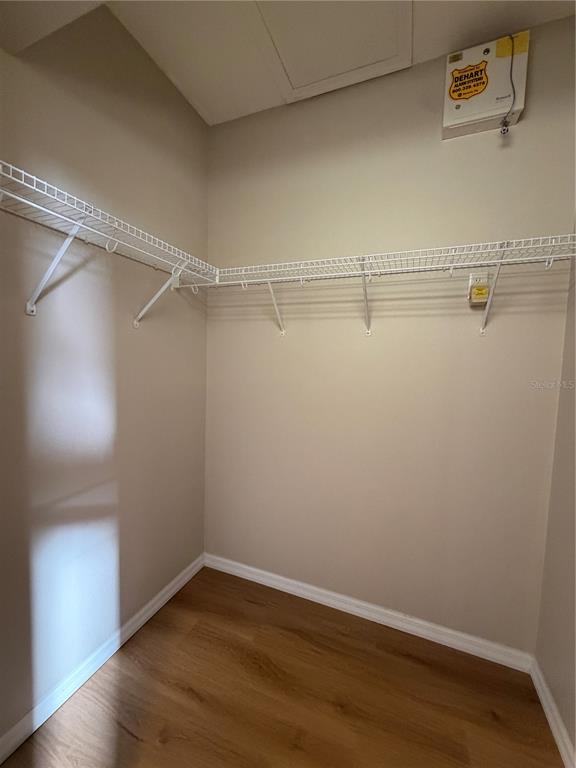 12418 24th Street East Parrish, FL 34219 - Photo 37 of 59 a view of a room with racks on the wall