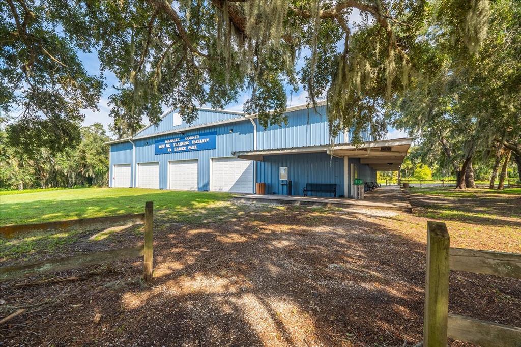 12418 24th Street East Parrish, FL 34219 - Photo 55 of 59 a view of a house with a yard