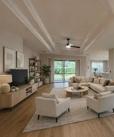 a living room with fireplace furniture and a flat screen tv