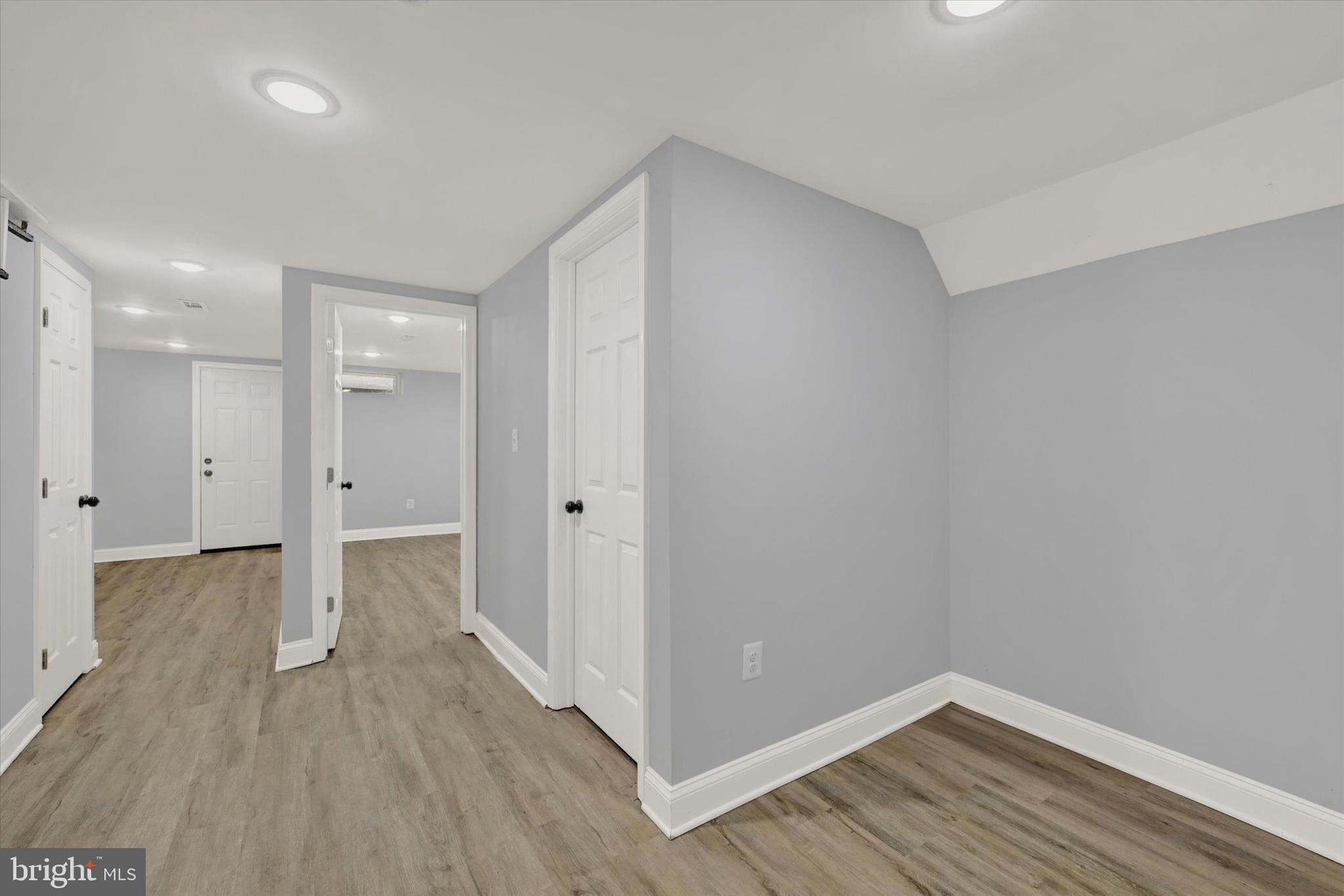 3105 Frisby Street Baltimore, MD 21218 - Photo 18 of 22 a view of a room with wooden floor