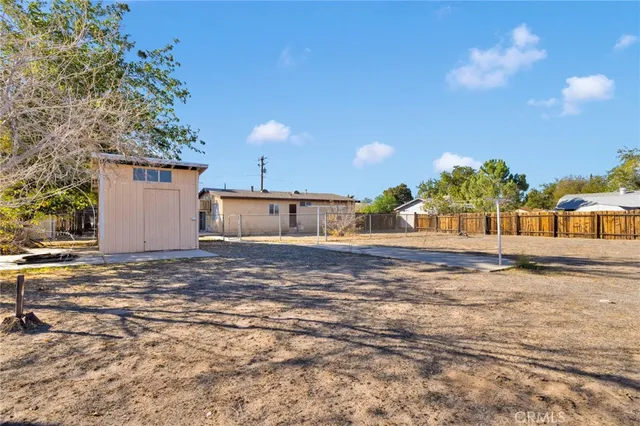 a house view with a yard