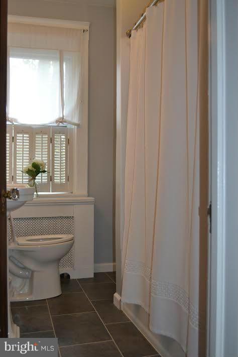 3206 Beverly Road Baltimore, MD 21214 - Photo 23 of 30 Bath with new floor, sink, toilet and cabinet.
