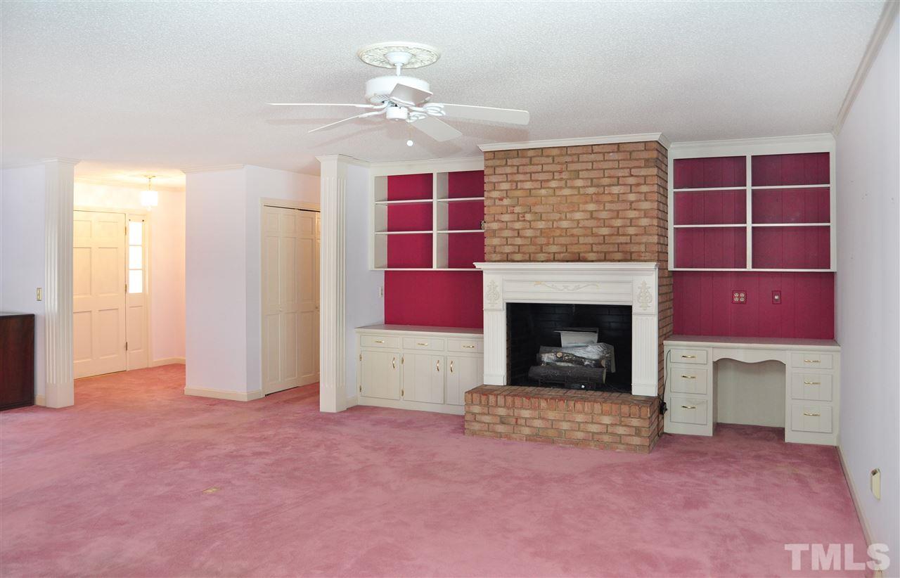 323 Peppermill Road Sanford, NC 27332 - Photo 3 of 22 a living room with furniture and a fireplace