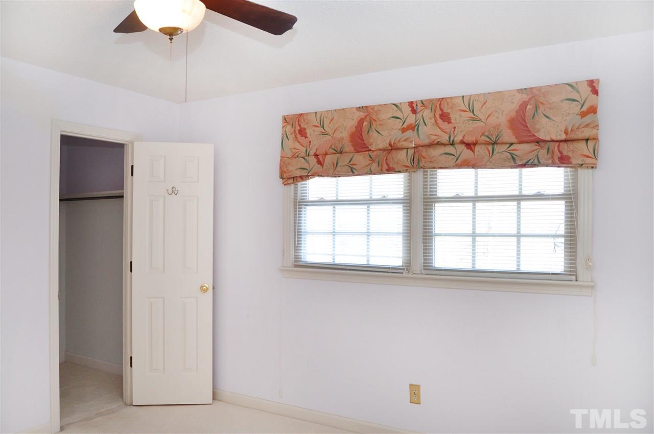 323 Peppermill Road Sanford, NC 27332 - Photo 22 of 22 a view of an empty room with a window
