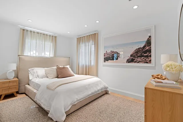 a view of a chairs and tables in the patio and a fountain