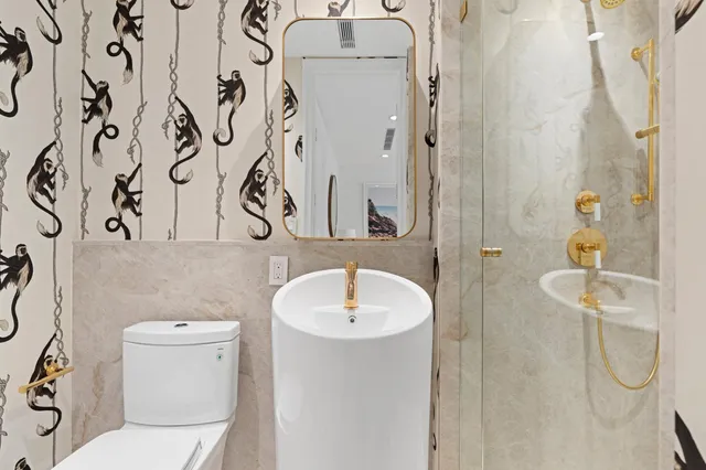 a view of a living room and chandelier