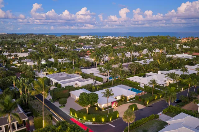 a view of a swimming pool with a seating space