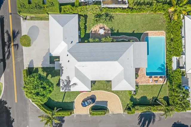 front view of a house with a garden
