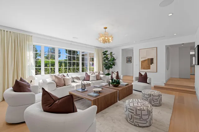 a kitchen with granite countertop a sink stove and cabinets