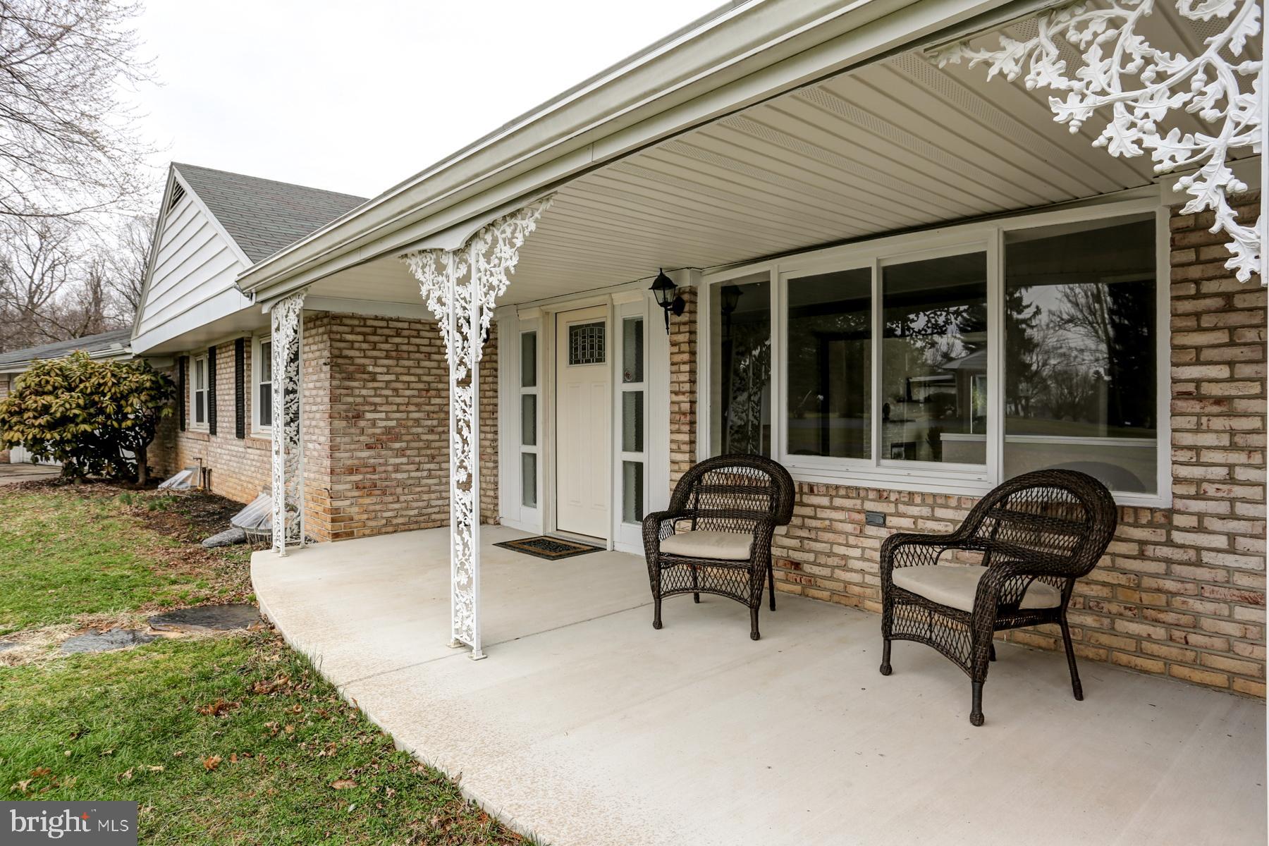 669 Truce Road New Providence, PA 17560 - Photo 2 of 41 Rocking chair front porch