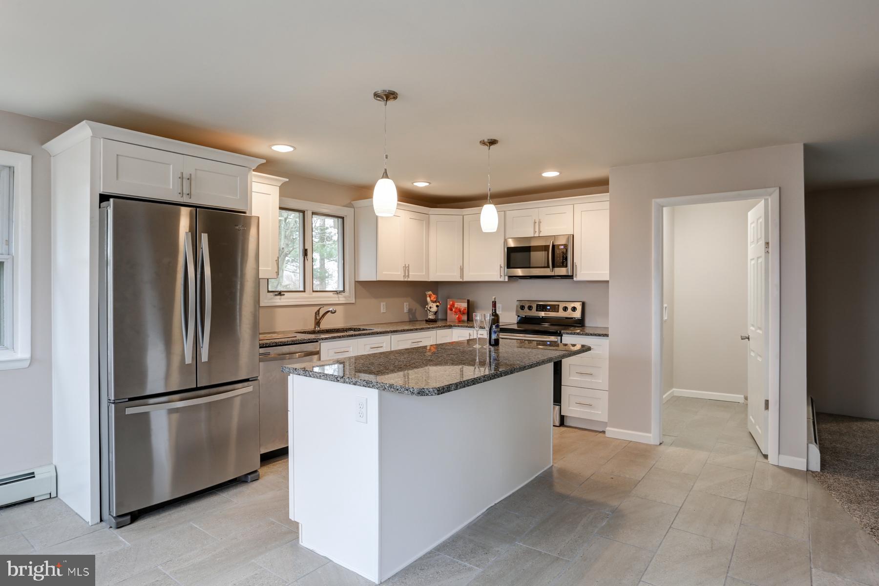 669 Truce Road New Providence, PA 17560 - Photo 14 of 41 Remodeled light and airy kitchen