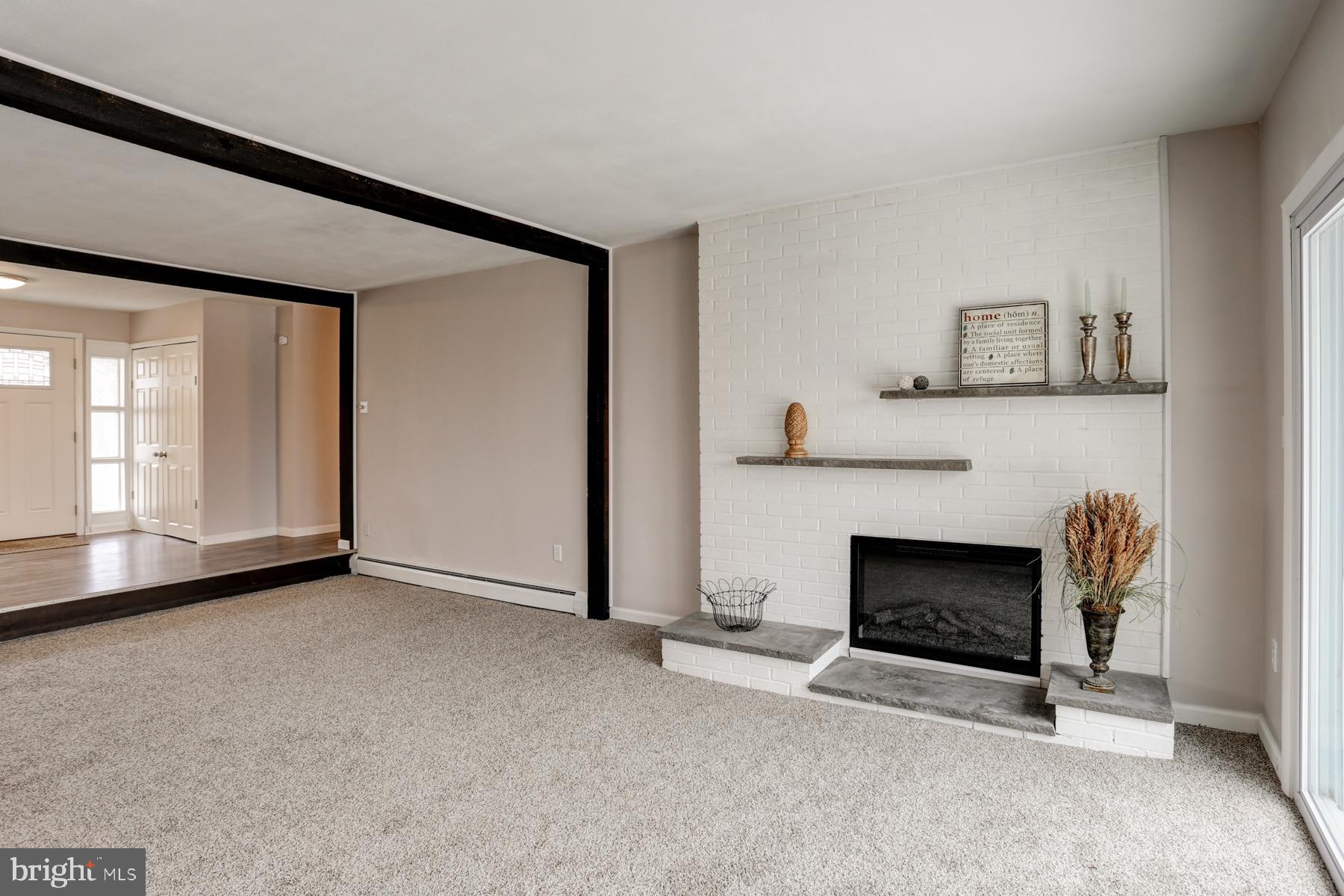 669 Truce Road New Providence, PA 17560 - Photo 10 of 41 Relax in front of the cozy fireplace.