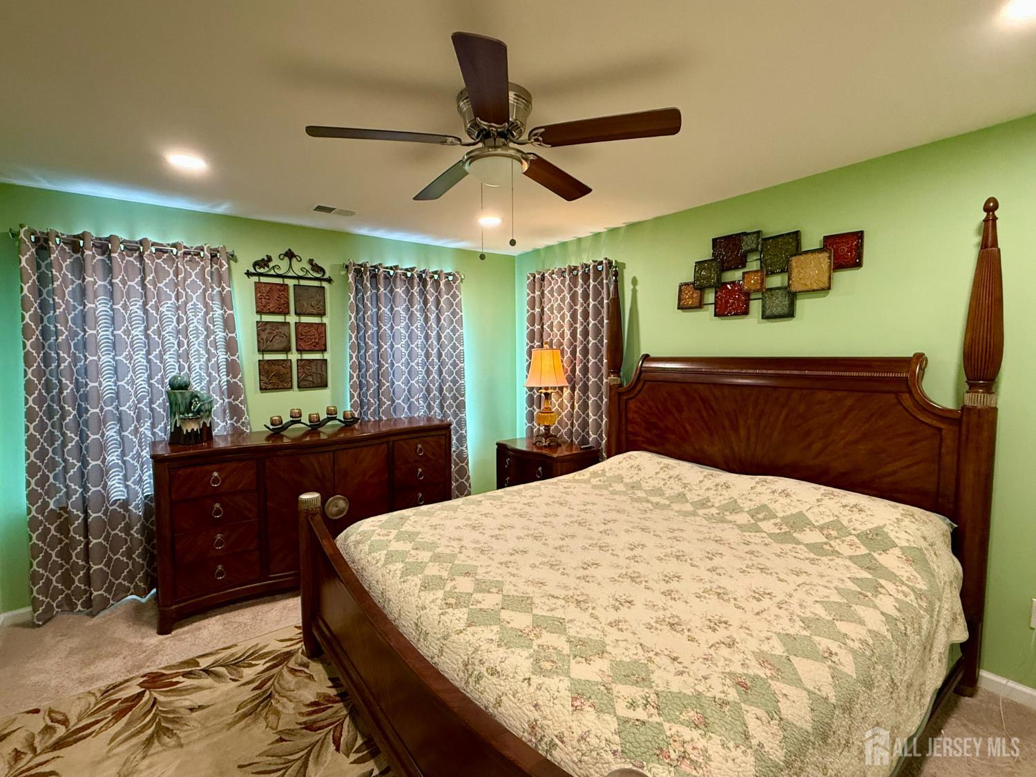 301 Matutina Road Monroe Township, NJ 08831 - Photo 13 of 42 a bedroom with a large bed and a dresser