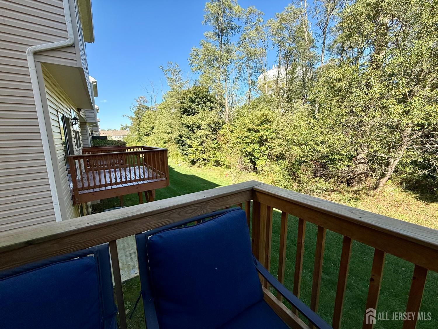 301 Matutina Road Monroe Township, NJ 08831 - Photo 39 of 42 a view of balcony with wooden floor and fence